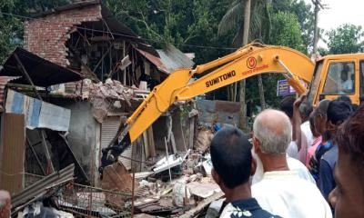 সিরাজগঞ্জে পানি উন্নয়ন বোর্ডের জমিতে উচ্ছেদ অভিযান