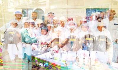 শাহজাদপুরে ‍‍`রতনকান্দি গ্রাম উন্নয়ন ফোরাম‍‍`র উদ্যোগে  ঈদ উপহার বিতরন