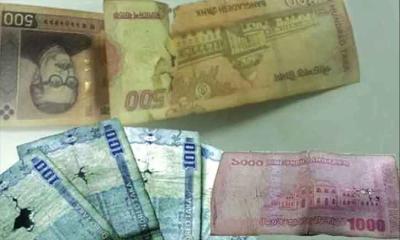 ছেঁড়া-ফাটা নোট নিয়ে ‘কড়া’ নির্দেশনা কেন্দ্রীয় ব্যাংকের